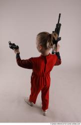 DENISA WITH TWO GUNS